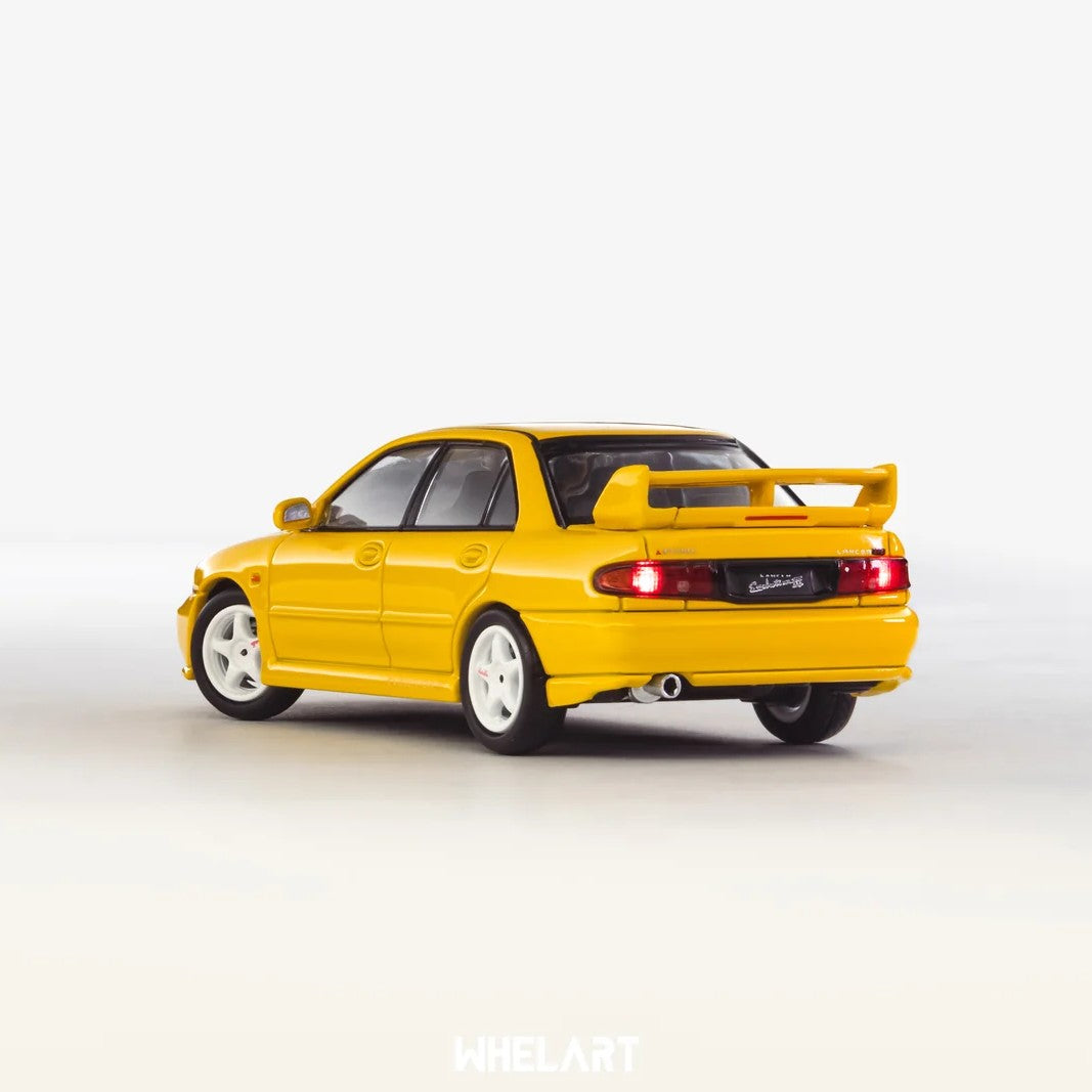 MITSUBISHI Lancer Evolution 3 Yellow, 1:64 Scale Diecast Car